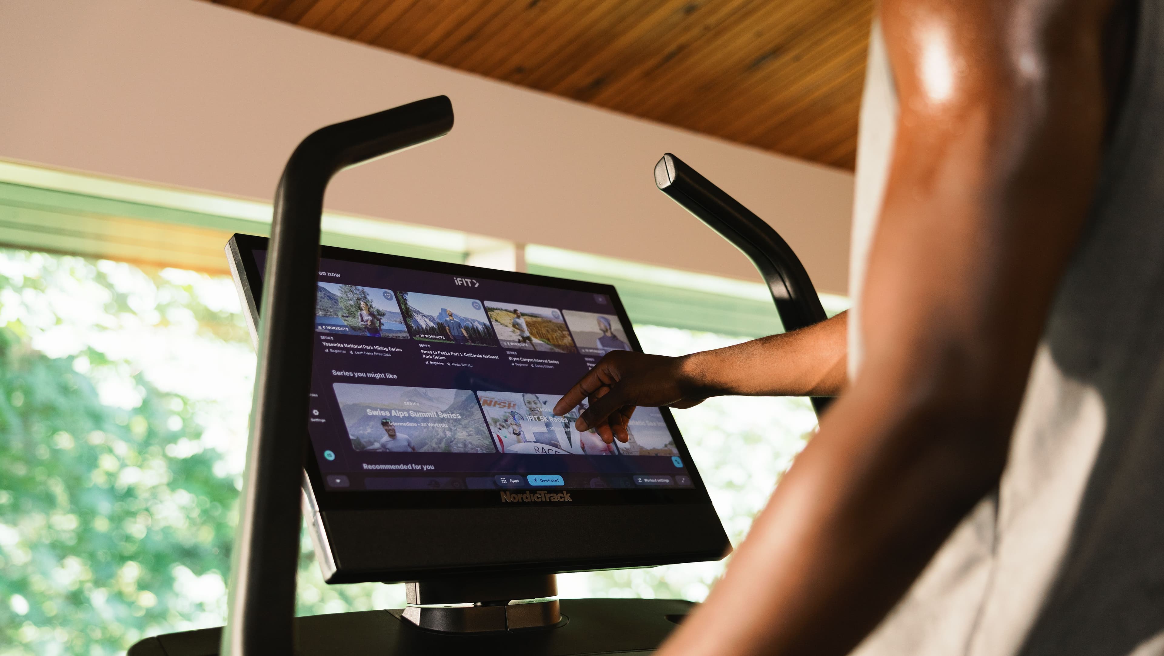 Browse iFIT's trainer-led workout library, including national park hikes and guided 5K races, directly from your NordicTrack treadmill's touchscreen console.