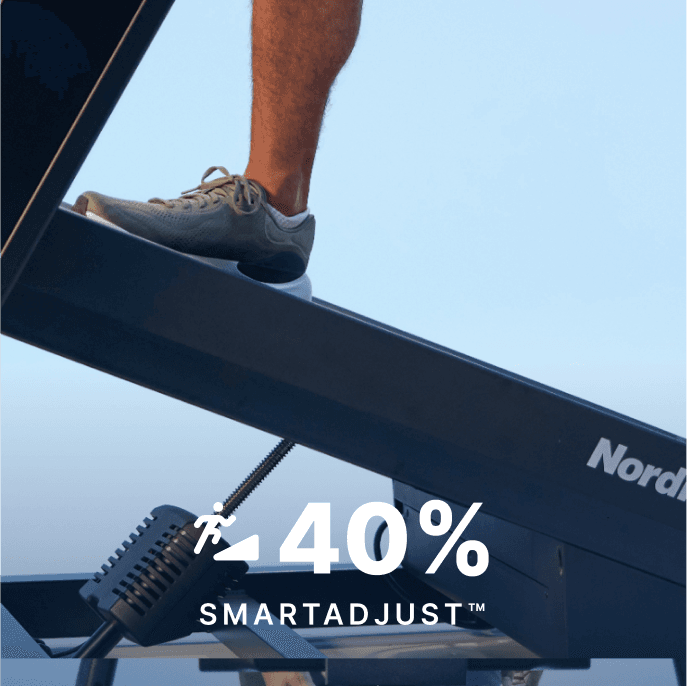The X24 raised to a 40% incline with a man standing on the deck.